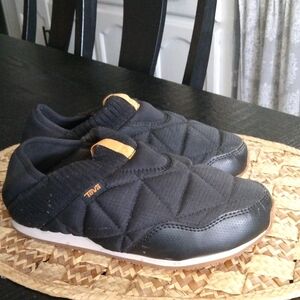 Teva Black and Orange Quilted Slip-Ons